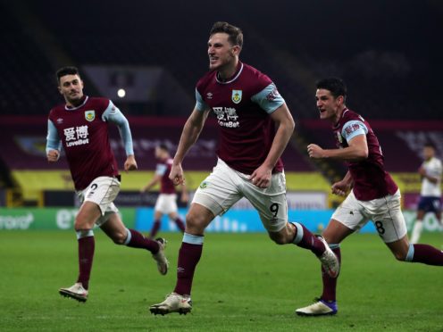 Burnley’s Chris Wood celebrates scoring the winning goal (Molly Darlington/PA)