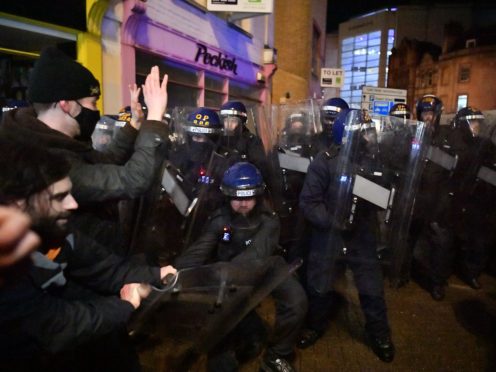 Police officers move in on demonstrators in Bristol during the ‘Kill The Bill’ protest against The Police, Crime, Sentencing and Courts Bill. Picture date: Friday March 26, 2021.
