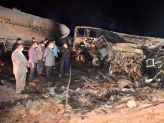 The site where a bus overturned in southern Egypt (Assiut Governorate media office via AP)