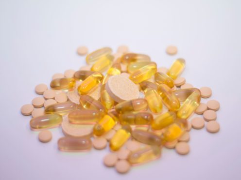 General view of multivitamins, vitamin C tablets and Omega 3 fish oil liquid capsules (PA)