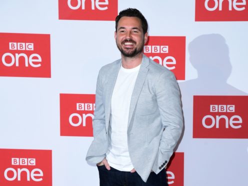 Martin Compston plays DI Steve Arnott in the hit BBC show (Ian West/PA)