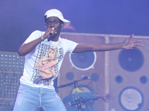 Lil Nas X could lose his top spot on the chart (Yui Mok/PA)