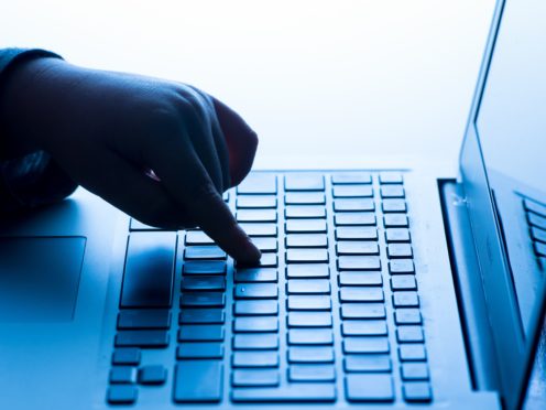 A child using a laptop computer. (Dominic Lipinski/PA)