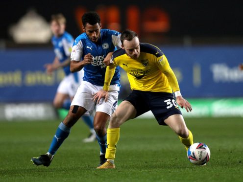 Brandon Barker, right, has a hamstring injury and is a doubt for Oxford (Andrew Matthews/PA)
