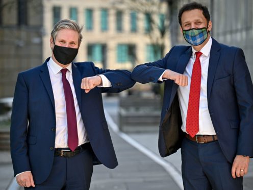 Sir Keir Starmer, left, and Scottish Labour leader Anas Sarwar have set out their plans to create thousands of jobs in Scotland (Jeff J Mitchell/PA)