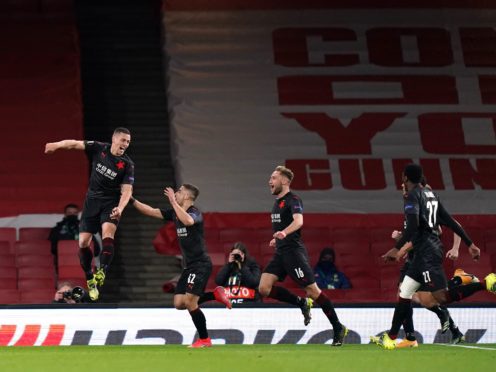 Tomas Holes celebrates scoring for Slavia Prague at Arsenal (John Walton/PA)