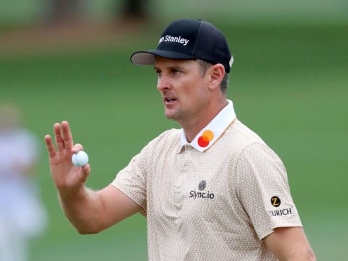Justin Rose reacts after his birdie on the second hole during the third round of the 85th Masters (Curtis Compton/Atlanta Journal-Constitution via AP)