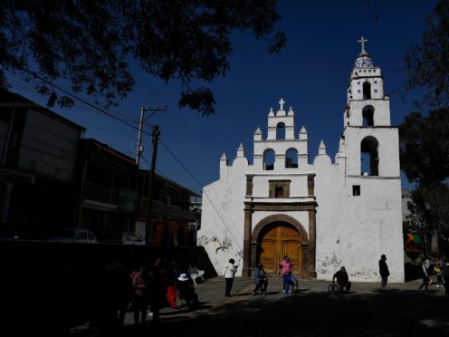 People over age 60 wait in an hours-long line to get the AstraZeneca vaccine, on the day Mexico began vaccinating its elderly population against Covid-19, outside a health centre in the outlying Milpa Alta borough of Mexico City (Rebecca Blackwell/AP)