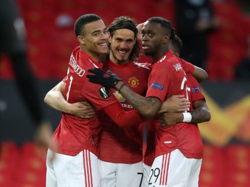 Edinson Cavani, centre, put Manchester United ahead on the night (Martin Rickett/PA)