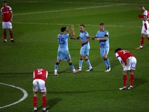 Coventry’s Matty James, Liam Kelly and Kyle McFadzean, left-right, celebrate after beating Rotherham (Tim Goode/PA)
