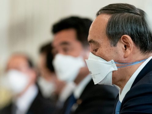 Japanese Prime Minister Yoshihide Suga has asked Pfizer for additional supplies of the Covid-19 vaccine to speed up an inoculation drive that lags behind many other countries (Andrew Harnik/AP)