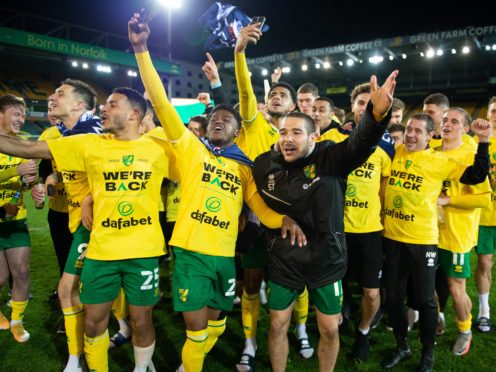 Norwich celebrate promotion back to the Premier League (Matthew Usher/Norwich/POOL).