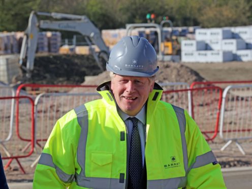 Boris Johnson during the visit to Gloucestershire (Jonathan Buckmaster/Daily Express/PA)
