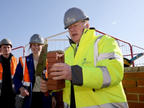 Boris Johnson, who on Monday visited a Barratt Homes development in Gloucestershire, said he did not think it was good news for fans (Jonathan Buckmaster/Daily Express/PA)