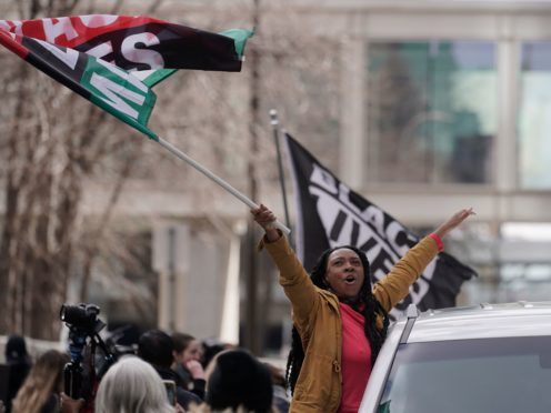 People cheer after a guilty verdict was announced at the trial of former Minneapolis police Officer Derek Chauvin for the death of George Floyd (Morry Gash/AP)