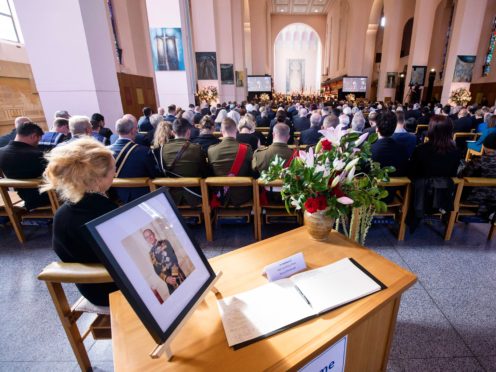 A portrait of Philip is displayed during a national memorial service in Wellington, New Zealand (Robert Kitchin/AP)