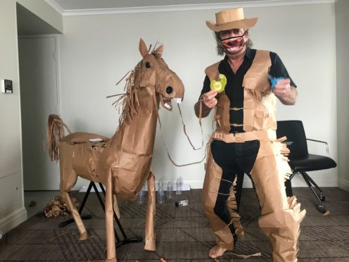 David Marriott with his paper horse Russell (David Marriott/AP)