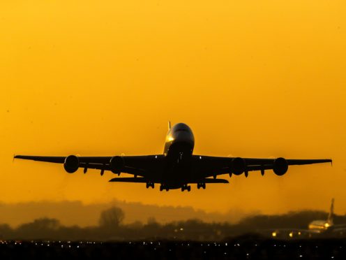 Many people are eagerly awaiting an update on the rules for foreign holidays (Steve Parsons/PA)