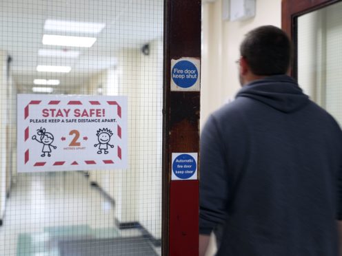 Union leaders and scientists have called for face coverings to remain in secondary schools and colleges beyond May (Andrew Matthews/PA)