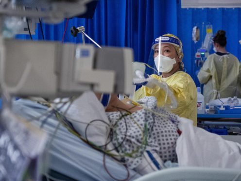 A nurse works on a patient in an Intensive Care Unit (PA)