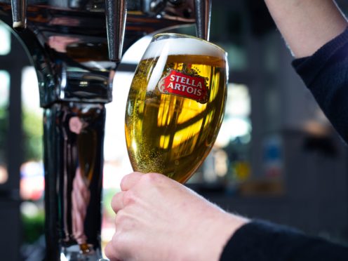 The boss of Stella Artois brewer AB InBev is to step down after 15 years (David Parry/PA)