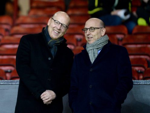 Manchester United co-chairman Joel Glazer, right, has written a letter to the club’s supporters (Martin Rickett/PA)