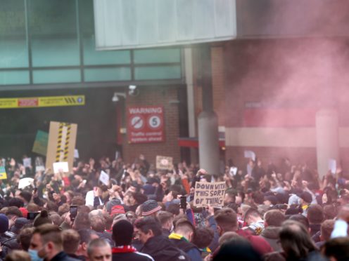 Fans protest against the Glazer family (PA)