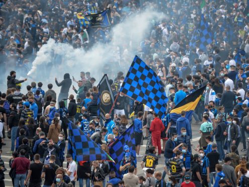 Inter Milan fans celebrate in the city (Claudio Furlan/LaPresse via AP)