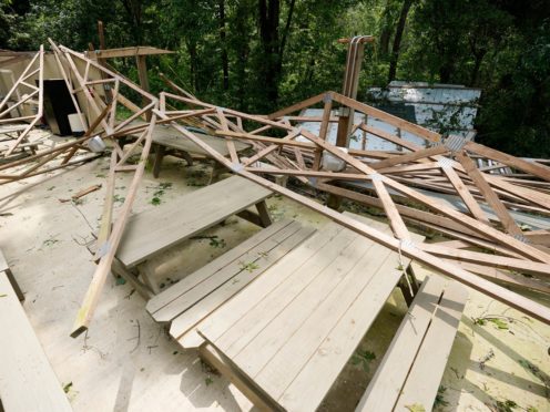 Rubble remains of the Ridge, a pavilion used by members of Parkview Church of God, after a direct hit by a tornado, Monday, May 3, 2021, in Yazoo County, Miss. A spate of tornadoes hit communities throughout the state on Sunday. (AP Photo/Rogelio V. Solis)