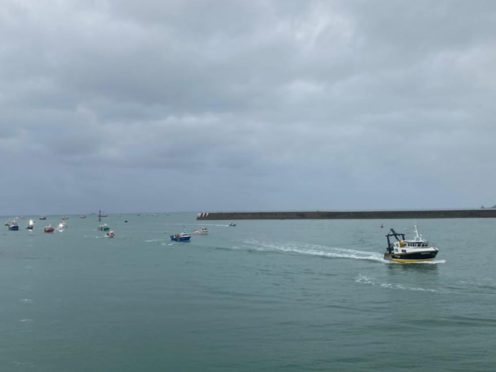 French fishing vessels gathering outside the harbour at St Helier (Josh Dearing/PA)