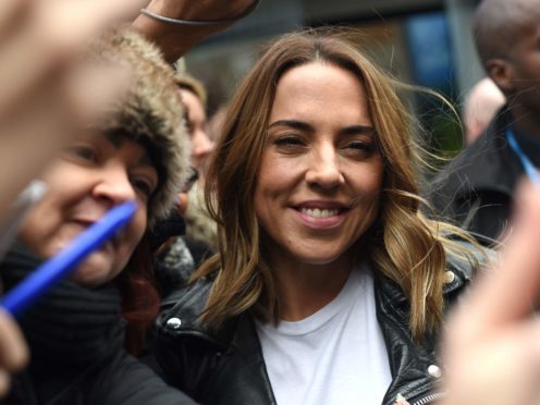 Spice Girl Melanie Chisholm confirms she would like to get the band back on tour (David Mirzoeff/PA)