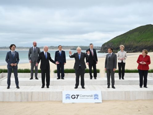 Canadian Prime Minister Justin Trudeau, president of the European Council Charles Michel, US President Joe Biden, Japanese Prime Minister Yoshihide Suga, British Prime Minister Boris Johnson, Italian Prime Minister Mario Draghi, French President Emmanuel Macron, president of the European Commission Ursula von der Leyen and German Chancellor Angela Merkel during the leaders’ official welcome and family photo in Carbis Bay during the G7 summit in Cornwall (Leon Neal/PA)