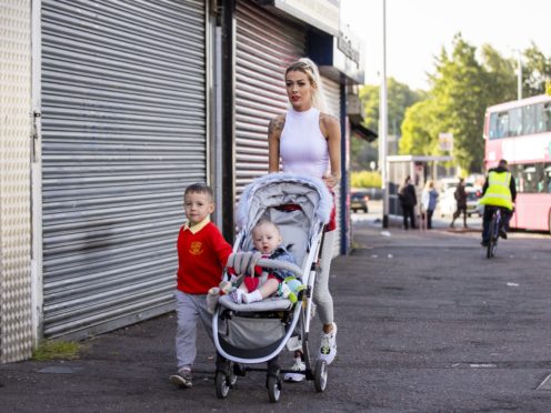 Alice-Lee Bunting with her sons Darraigh (four) and Keaghan Tommy Bunting (eight months) (Liam McBurney/PA)