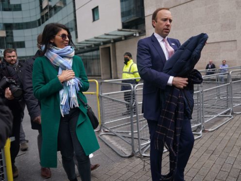 Matt Hancock with adviser Gina Coladangelo in May this year (Yui Mok/PA)
