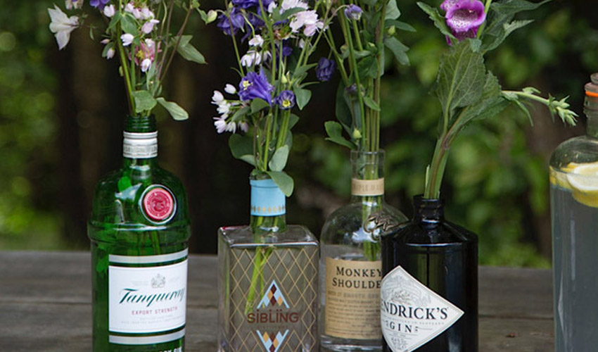 things to do with gin bottles FI Featured Image for 10 Great Things You Can Do with Your Old Gin Bottles