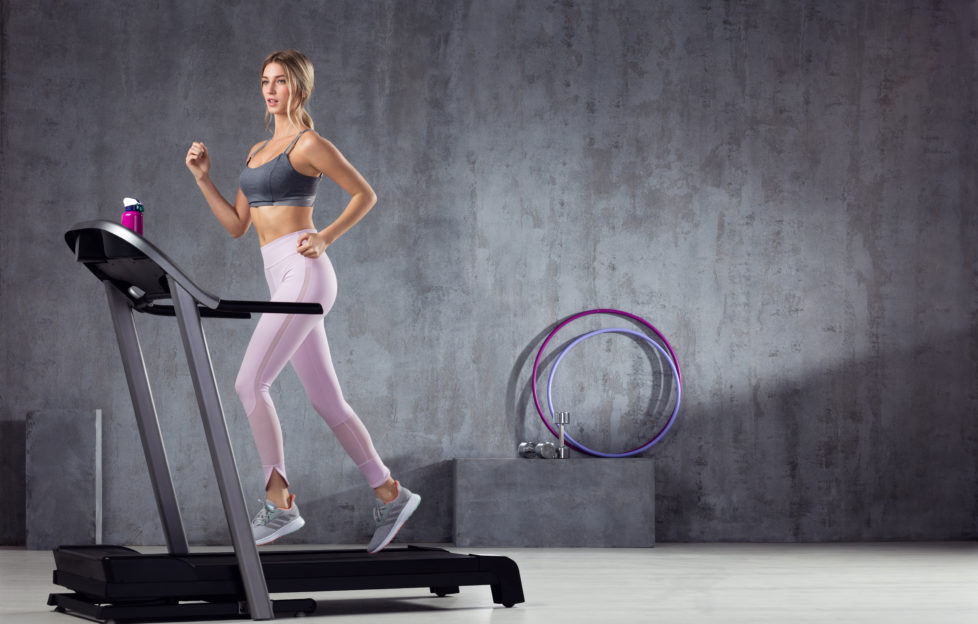 A woman working-out on treadmill