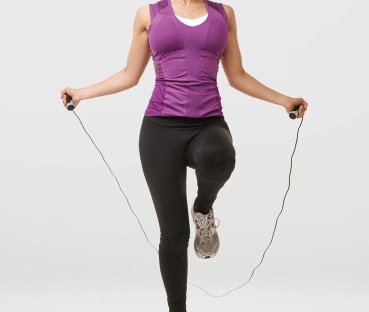 Woman using skipping rope
