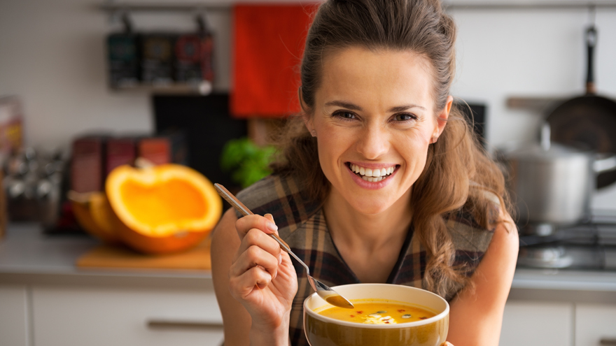 Lady eating homemade soup