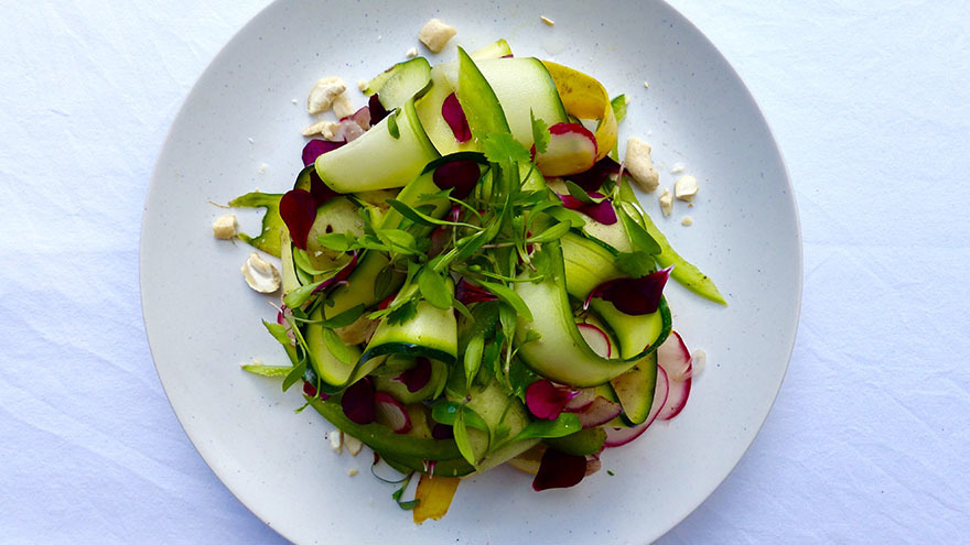 Raw vegetable salad with black garlic dressing