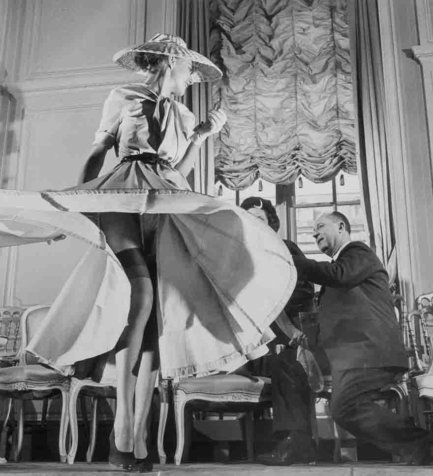Stockings were highlighted for the first time when Christian Dior (right) exhibited his French collection
