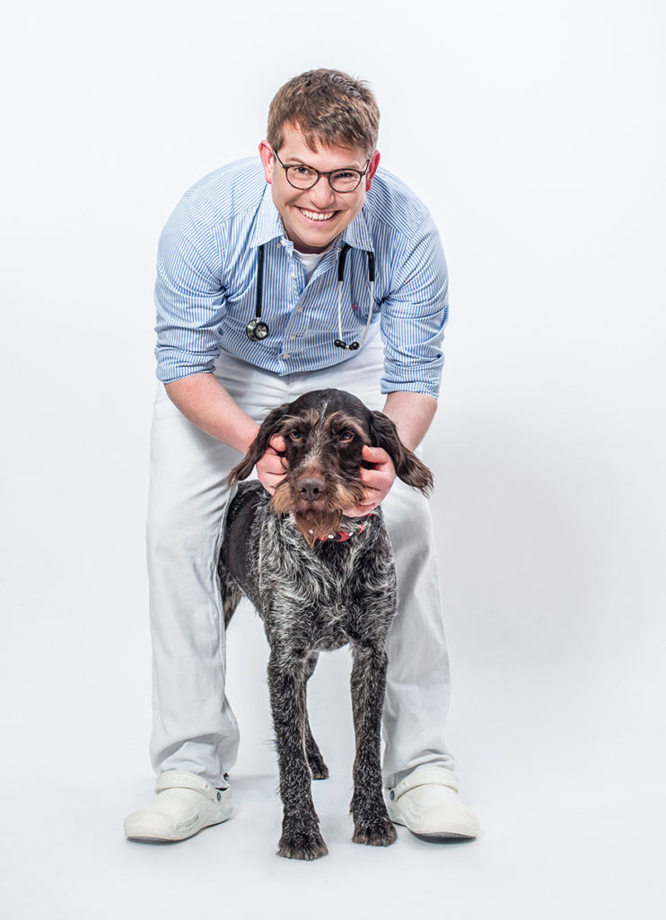 Man standing with dog