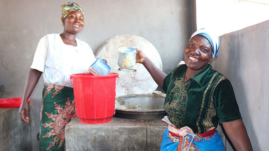 Esme (right) prepares to serve the likuni phala