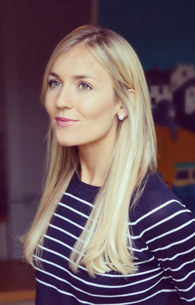 Image of Lily Soutter - blonde woman in navy blue and white stripey T-shirt