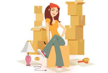 Woman surrounded by cardboard boxes