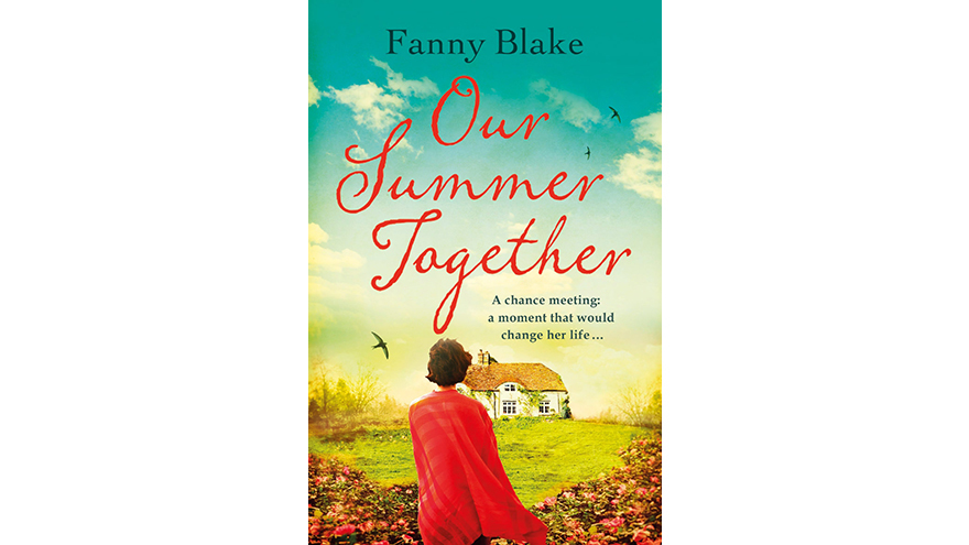 Our summer Together jacket woman in red looking at cottage