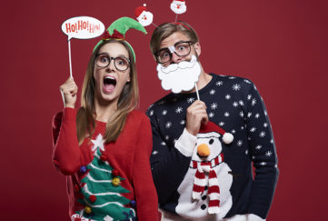 Couple with Christmas jumpers Pic: Istockphoto