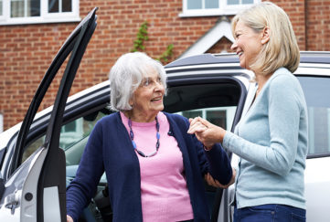 Lady helping a neighbour Pic: Shutterstock
