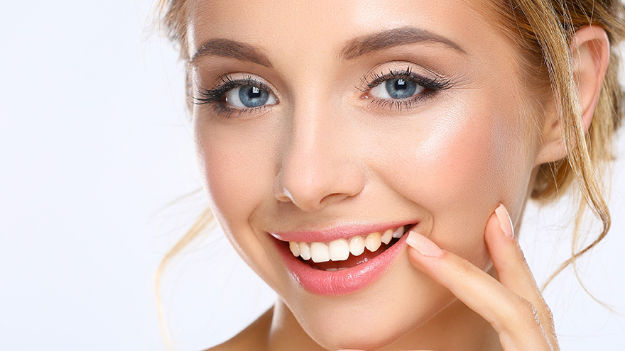 Blonde woman with a bright white smile