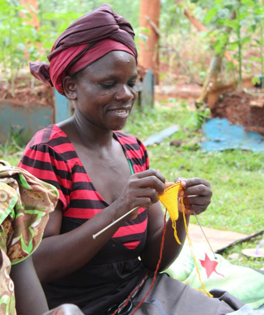 One lady in Uganda knitting for the appeal