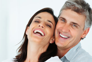 Close-up of a mature couple laughing